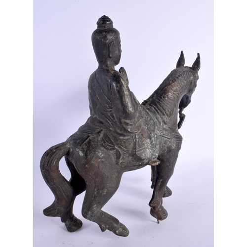 458 - A LARGE 19TH CENTURY CHINESE BRONZE FIGURE OF A HORSE modelled with attendants. 32 cm x 22 cm.