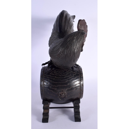 459 - A LARGE 19TH CENTURY JAPANESE MEIJI PERIOD BRONZE OKIMONO modelled as a cock upon a barrel. 37 cm x ... 