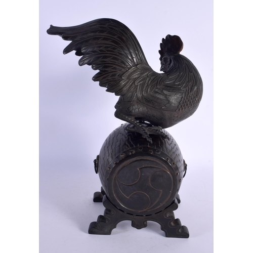 459 - A LARGE 19TH CENTURY JAPANESE MEIJI PERIOD BRONZE OKIMONO modelled as a cock upon a barrel. 37 cm x ... 