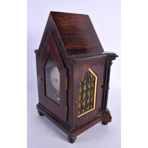 467 - A FINE VICTORIAN GOTHIC REVIVAL ROSEWOOD MANTEL CLOCK of elegant form. 24 cm x 12 cm.