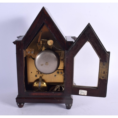 467 - A FINE VICTORIAN GOTHIC REVIVAL ROSEWOOD MANTEL CLOCK of elegant form. 24 cm x 12 cm.