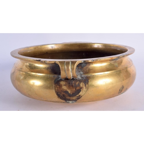 477 - A 19TH CENTURY MIDDLE EASTERN BRONZE CENSER. 22 cm wide.