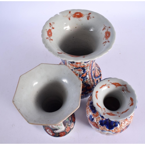 482 - THREE 19TH CENTURY JAPANESE MEIJI PERIOD IMARI VASES. Largest 23 cm high. (3)