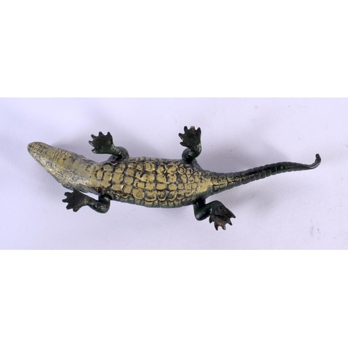 492 - A CONTEMPORARY COLD PAINTED BRONZE CROCODILE. 22 cm long.