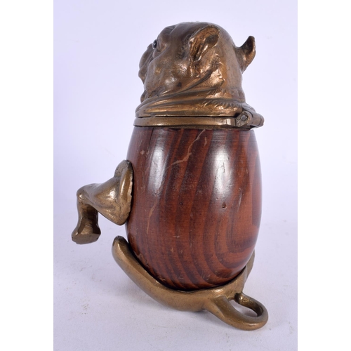 495 - A 19TH CENTURY EUROPEAN CARVED WOOD BRONZE INKWELL in the form of a dog. 15 cm x 8 cm.