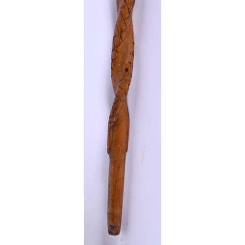 496 - AN ANTIQUE CONTINENTAL FOLK ART CARVED WOOD TRIBAL WALKING STAFF decorated with snakes and females. ... 