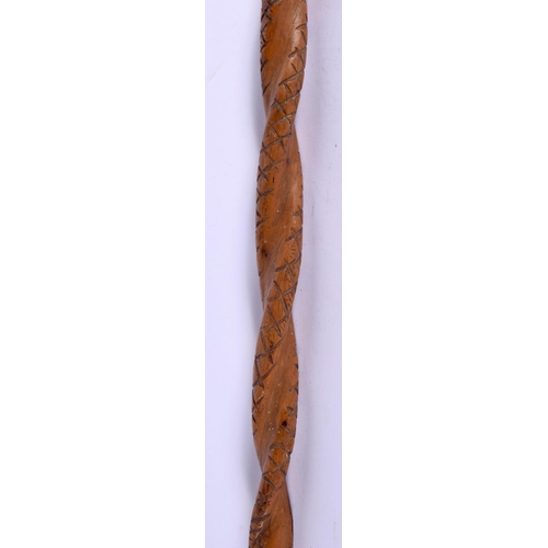 496 - AN ANTIQUE CONTINENTAL FOLK ART CARVED WOOD TRIBAL WALKING STAFF decorated with snakes and females. ... 