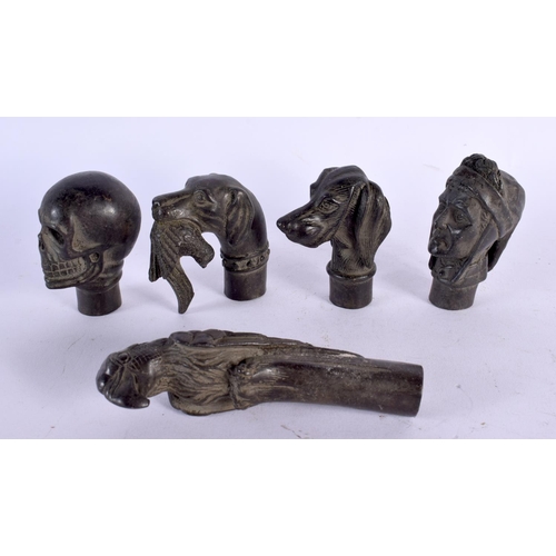 502 - FIVE CONTEMPORARY BRONZE WALKING CANE HANDLES. Largest 13 cm long. (5)