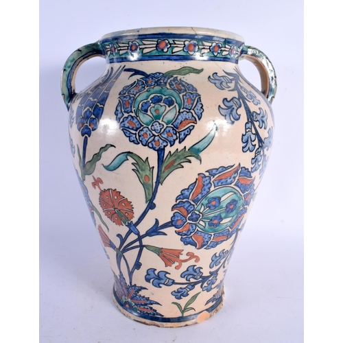 510 - A LARGE EARLY 20TH CENTURY MIDDLE EASTERN JERUSALEM VASE painted in the Iznik style. 32 cm x 20 cm.