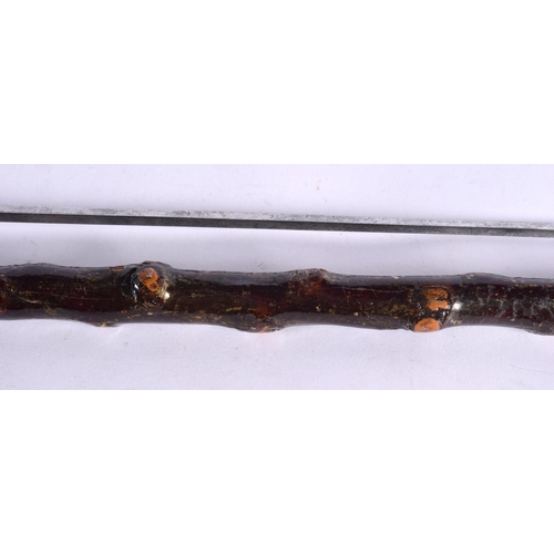 515 - AN ANTIQUE SWORD STICK. 82 cm long.