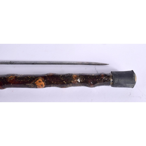 515 - AN ANTIQUE SWORD STICK. 82 cm long.