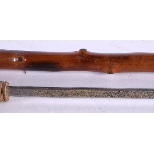 516 - AN ANTIQUE SWORD STICK. 82 cm long.