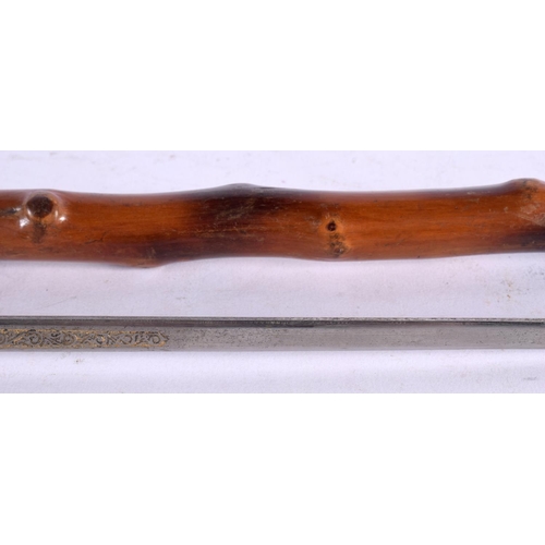 516 - AN ANTIQUE SWORD STICK. 82 cm long.