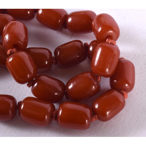 521 - A CHERRY AMBER TYPE NECKLACE. 42 grams. 46 cm long.