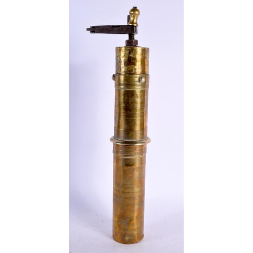 526 - AN ANTIQUE TURKISH BRASS COFFEE GRINDER decorated with motifs. 40 cm long.