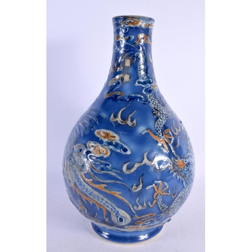 529 - AN 18TH/19TH CENTURY CHINESE BLUE GLAZED PORCELAIN VASE Qianlong/Jiaqing. 34 cm x 16 cm.