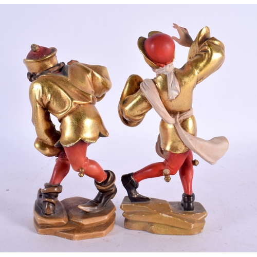 530 - A PAIR OF VINTAGE ITALIAN POLYCHROMED WOOD FIGURES modelled as dancers. 18 cm high.