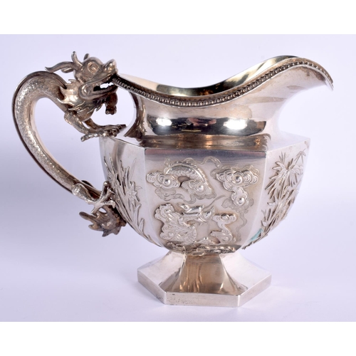 537 - A FINE 19TH CENTURY CHINESE EXPORT SILVER TEASET by Wang Hing, decorated with prunus and leaves and ... 