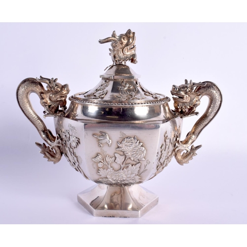 537 - A FINE 19TH CENTURY CHINESE EXPORT SILVER TEASET by Wang Hing, decorated with prunus and leaves and ... 