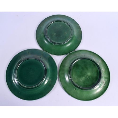 54 - A SET OF EIGHTEEN ANTIQUE GREEN GLAZED MAJOLICA CABBAGE LEAF DISHES. 22 cm diameter. (18)