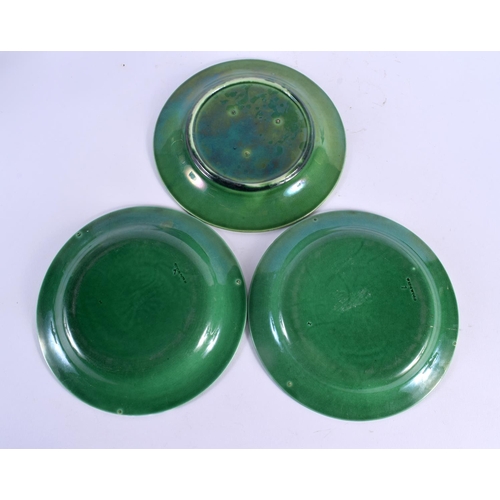 54 - A SET OF EIGHTEEN ANTIQUE GREEN GLAZED MAJOLICA CABBAGE LEAF DISHES. 22 cm diameter. (18)