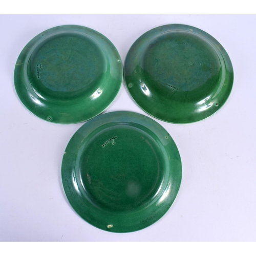 54 - A SET OF EIGHTEEN ANTIQUE GREEN GLAZED MAJOLICA CABBAGE LEAF DISHES. 22 cm diameter. (18)