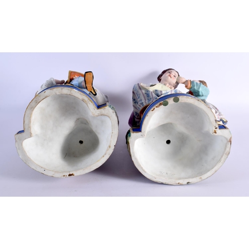 55 - A HUGE PAIR OF 19TH CENTURY FRENCH BISQUE PORCELAIN FIGURES modelled with children. 46 cm x 14 cm.