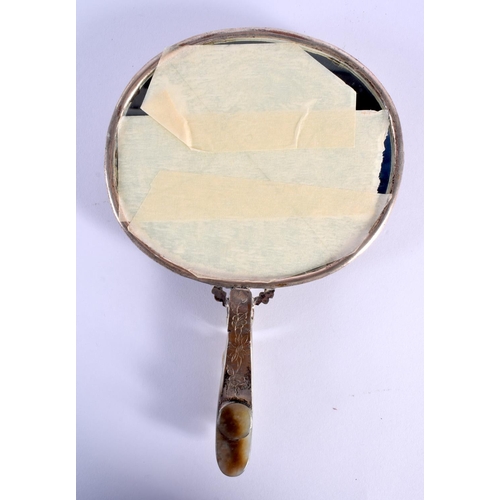 551 - A CHINESE QING DYNASTY JADE AND HARDSTONE HAND MIRROR with dragon handle. 21 cm x 14 cm.