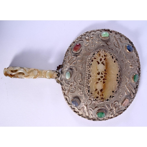 551 - A CHINESE QING DYNASTY JADE AND HARDSTONE HAND MIRROR with dragon handle. 21 cm x 14 cm.