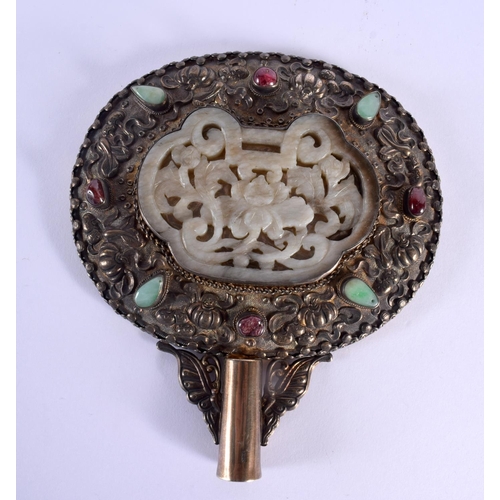 552 - A CHINESE QING DYNASTY SILVER AND JADE HAND MIRROR inset with a late Ming/Qing floral roundel. 15 cm... 