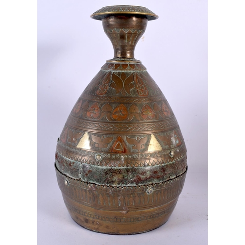 563 - A LARGE ANTIQUE MIDDLE EASTERN PERSIAN COPPER ALLOY JUG decorated with floral motifs together with a... 