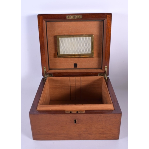 565 - A VINTAGE DUNHILL MAHOGANY CIGAR HUMIDOR together with a cigar. 24 cm x 20 cm.