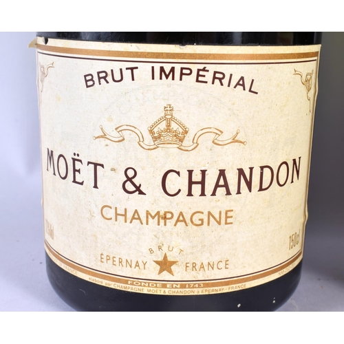 567 - TWO MAGNUMS OF MOET & CHANDON CHAMPAGNE. 41 cm high. (2)