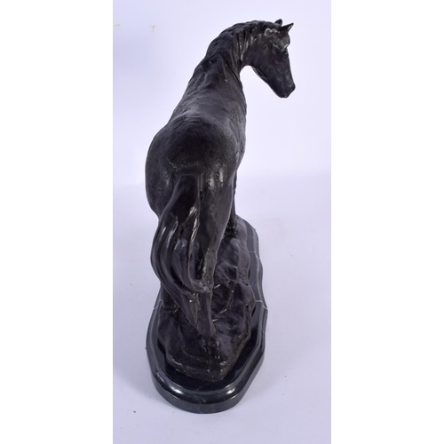 573 - A CONTEMPORARY BRONZE FIGURE OF A HORSE. 24 cm x 22 cm.