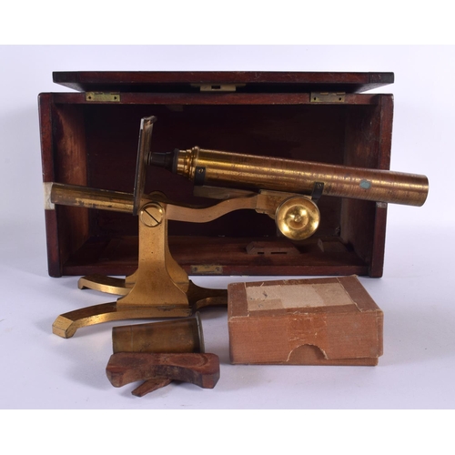 574 - AN ANTIQUE BRASS MICROSCOPE. 32 cm high.