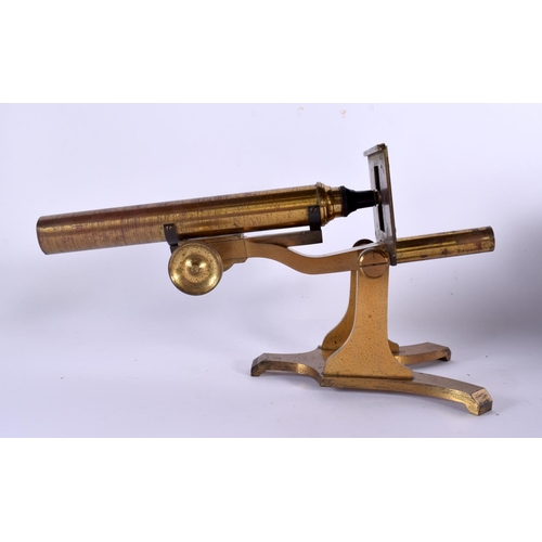 574 - AN ANTIQUE BRASS MICROSCOPE. 32 cm high.