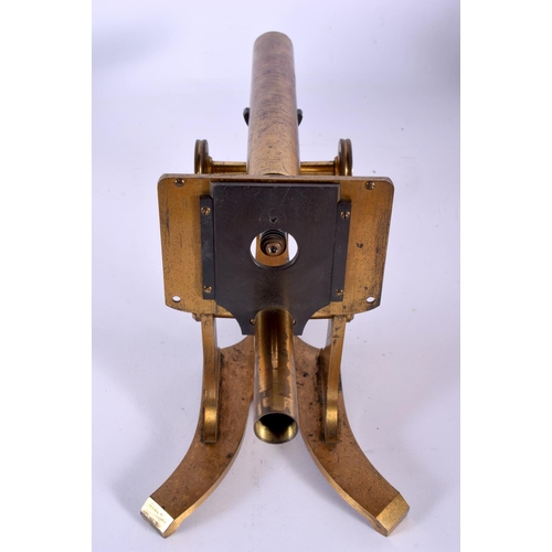 574 - AN ANTIQUE BRASS MICROSCOPE. 32 cm high.