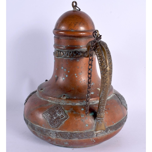 578 - AN ANTIQUE MIDDLE EASTERN MIXED METAL COFFEE POT. 18 cm x 14 cm.