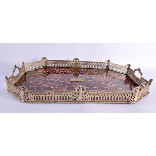 581 - A LARGE EARLY 20TH CENTURY SILVER PLATED TORTOISESHELL TRAY modelled in the gothic style. 64 cm x 48... 