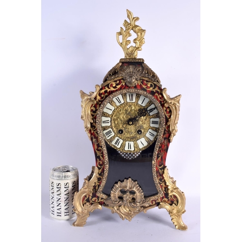 589 - A 19TH CENTURY FRENCH BRONZE MOUNTED BOULLE TORTOISESHELL CLOCK with floral overlaid vines. 48 cm x ... 