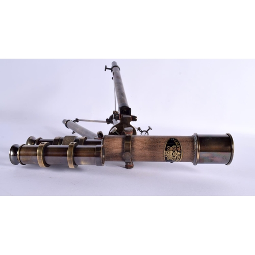 592 - A CONTEMPORARY LEATHER WRAPPED TELESCOPE. 31 cm x 25 cm.