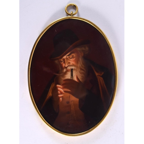 60 - AN ANTIQUE EUROPEAN PORELAIN PLAQUE depicting a smoking man. 18 cm x 12 cm.