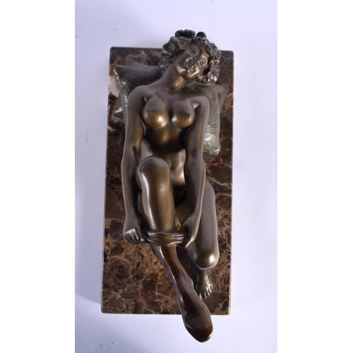 608 - A RARE EARLY 20TH CENTURY COLD PAINTED BRONZE EROTIC GROUP modelled as a female putting on stockings... 