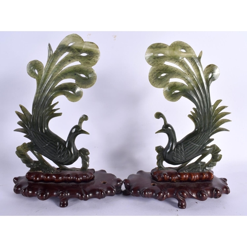 615 - THREE EARLY 20TH CENTURY CHINESE SPINACH JADE BIRDS Late Qing/Republic. Largest 18 cm x 14 cm. (3)