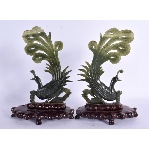 615 - THREE EARLY 20TH CENTURY CHINESE SPINACH JADE BIRDS Late Qing/Republic. Largest 18 cm x 14 cm. (3)