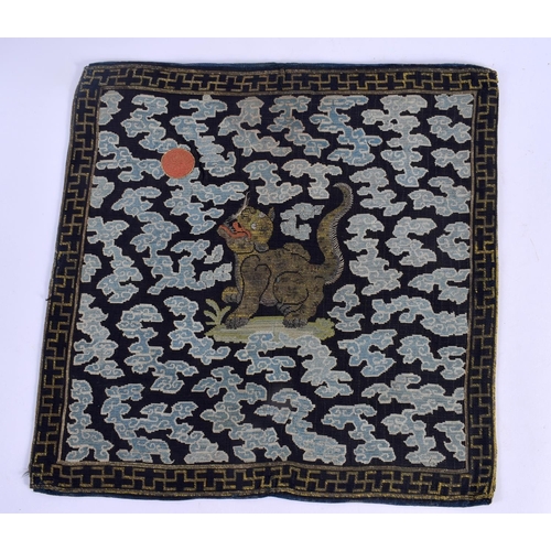 619 - A FINE PAIR OF 18TH CENTURY CHINESE KESI SILK BADGES depicting scowling cats amongst clouds and cora... 