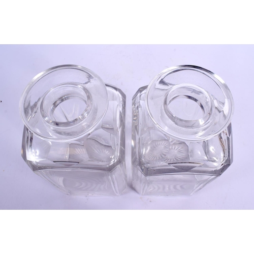 62 - A PAIR OF ANTIQUE WHISKEY GLASS DECANTERS. 26 cm high.