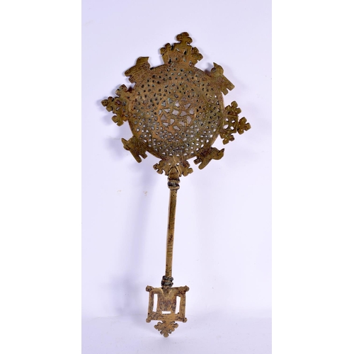 629 - AN UNUSUAL 19TH CENTURY AFRICAN BRONZE STAR SCEPTRE together with an embossed St George type copper ... 