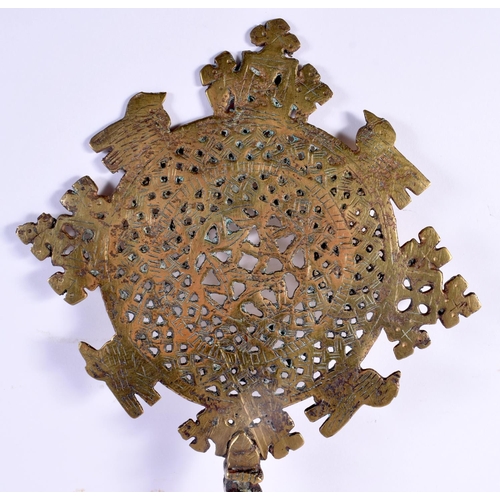 629 - AN UNUSUAL 19TH CENTURY AFRICAN BRONZE STAR SCEPTRE together with an embossed St George type copper ... 