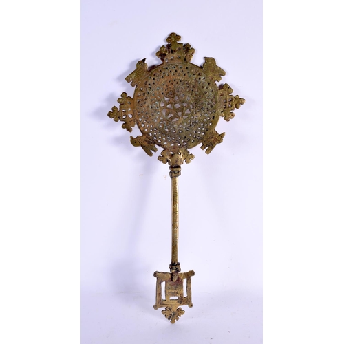 629 - AN UNUSUAL 19TH CENTURY AFRICAN BRONZE STAR SCEPTRE together with an embossed St George type copper ... 